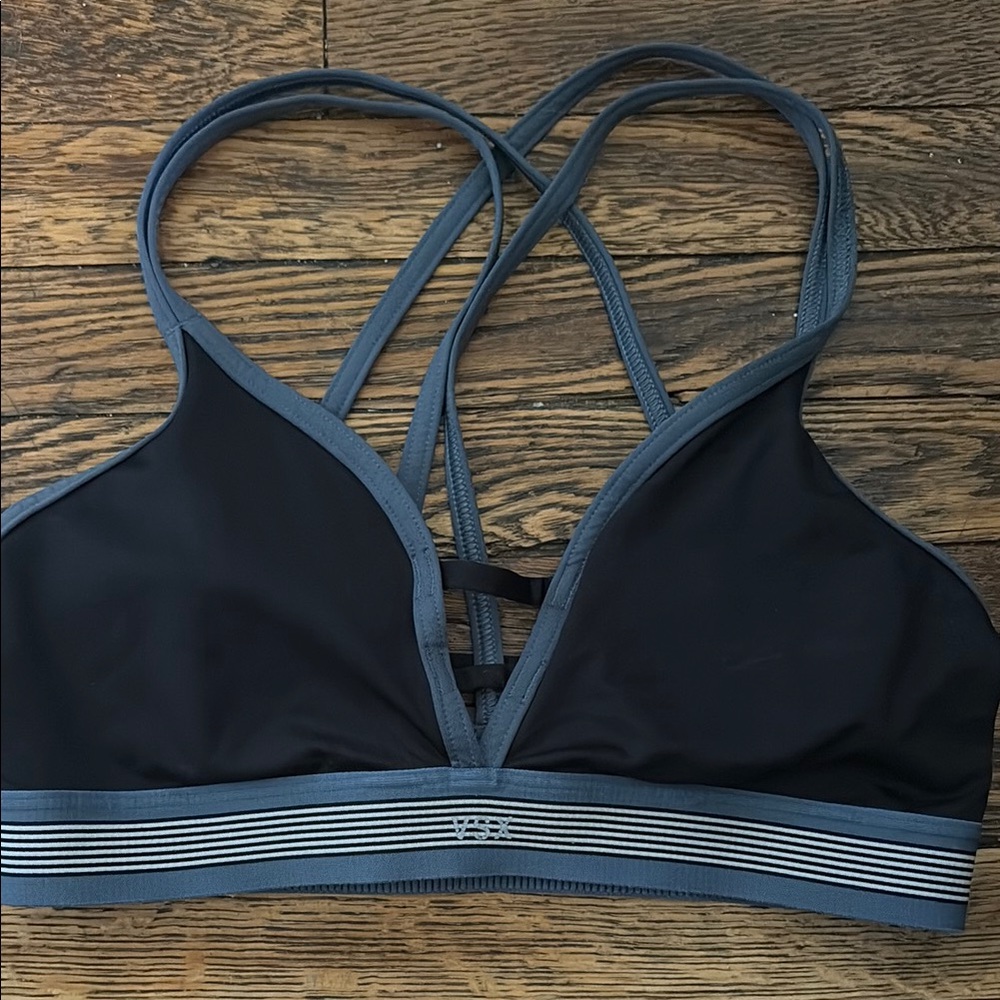 VSX Black and Gray Sports Bra with Strappy Back and Moisture-Wicking Fabric